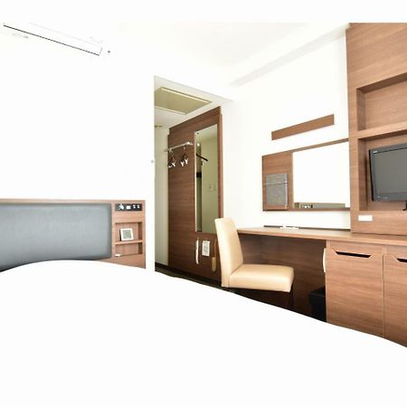 Hotel New Amami Bagian luar foto