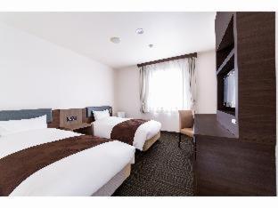 Hotel New Amami Ruang foto